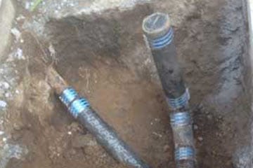 Sewer line repair for sewage pump system.